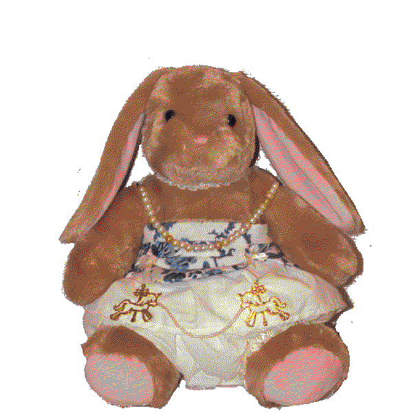 stuffed animal bunny in a blue and white floral patterned dress with pearl straps, decorated with gold charms.